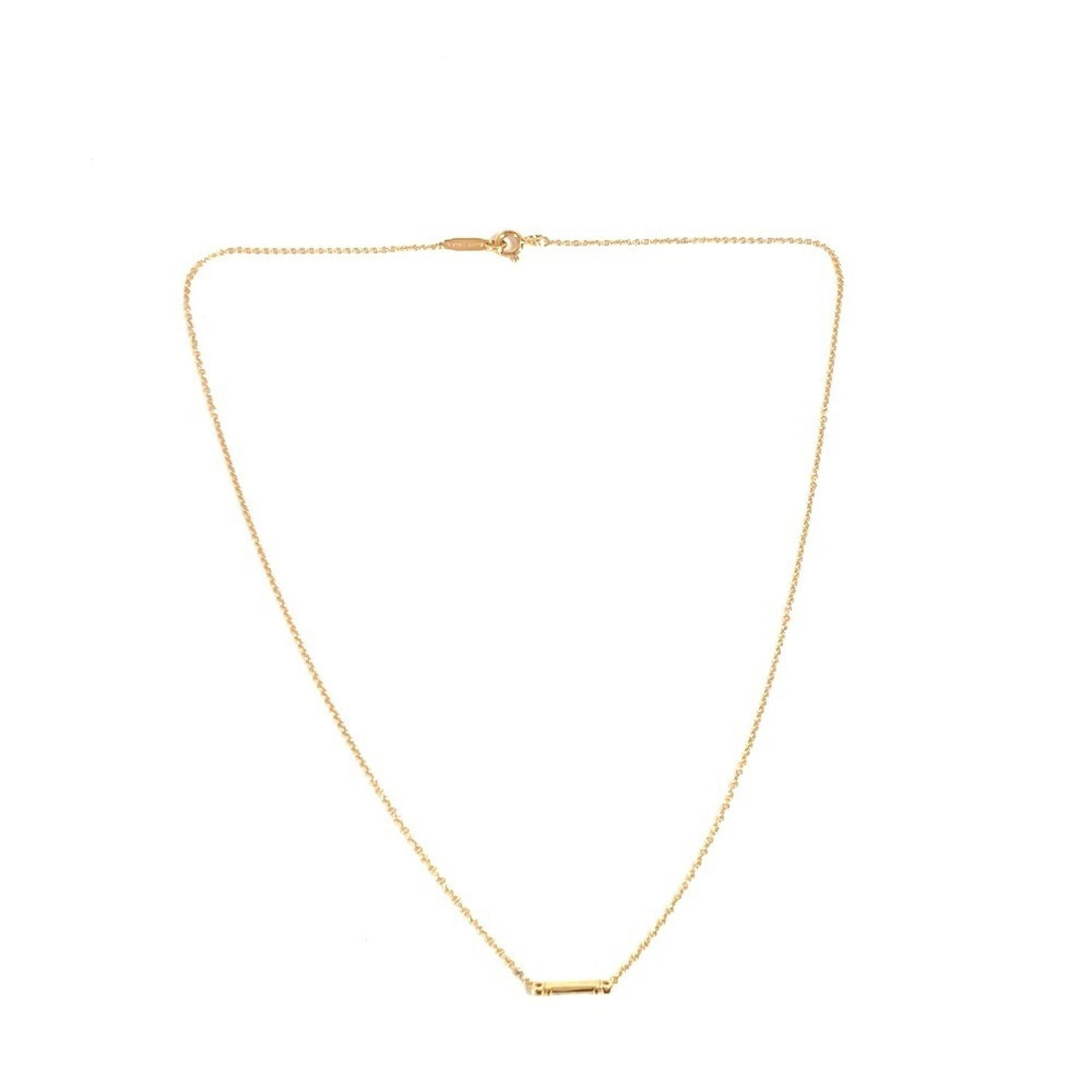Gold Fleur de Lis Necklace by Tiffany & Co Size 41 cm: Gold Fleur de Lis Necklace by Tiffany & Co Size 41 cm The Tiffany & Co. Fleur de Lis necklace features a gold design crafted in Italy. It is suitable for women and is presented in a gold color. The ne
