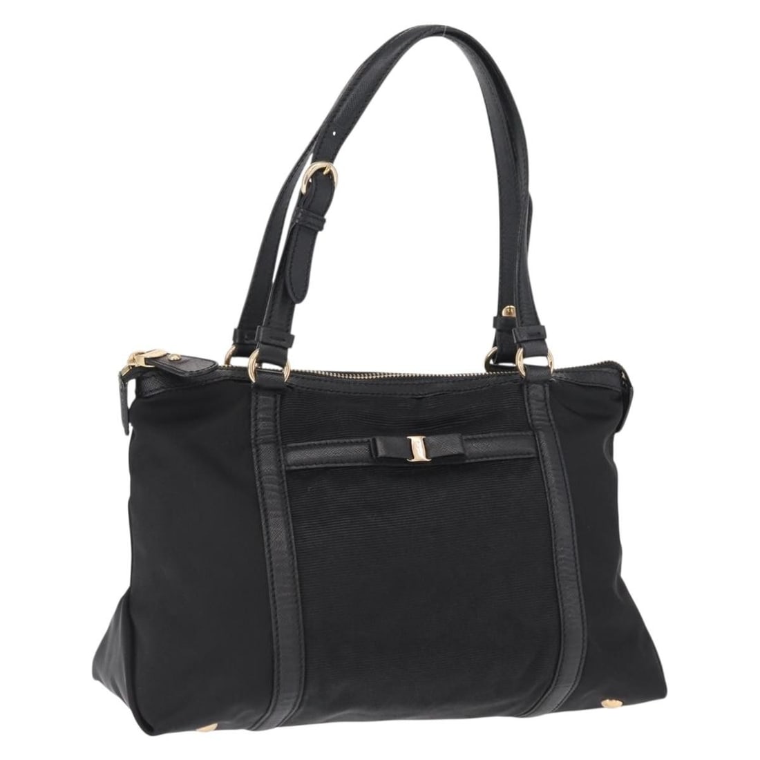 Black Nylon Vala Handbag by Salvatore Ferragamo Gold Tone Hardware: Black Nylon Vala Handbag by Salvatore Ferragamo Gold Tone Hardware This Salvatore Ferragamo Vala handbag features a black nylon exterior with gold-tone accents. The bag is made in Italy and includes d