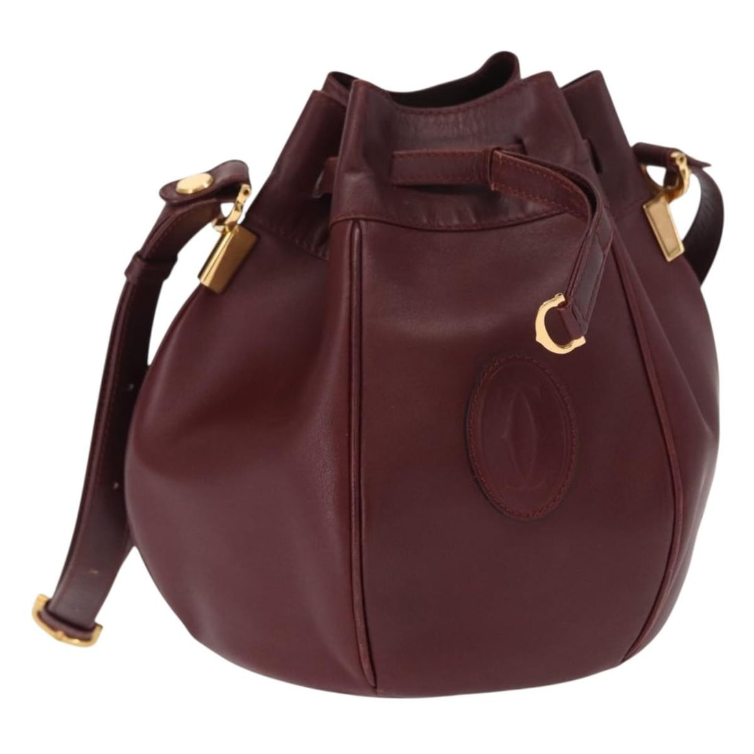 CARTIER Must Line Bordeaux Leather Shoulder Bag Gold Authentic: CARTIER Must Line Bordeaux Leather Shoulder Bag Gold Authentic Elevate your accessory collection with the CARTIER Must Line Shoulder Bag, crafted from luxurious leather in a stunning bordeaux and gold