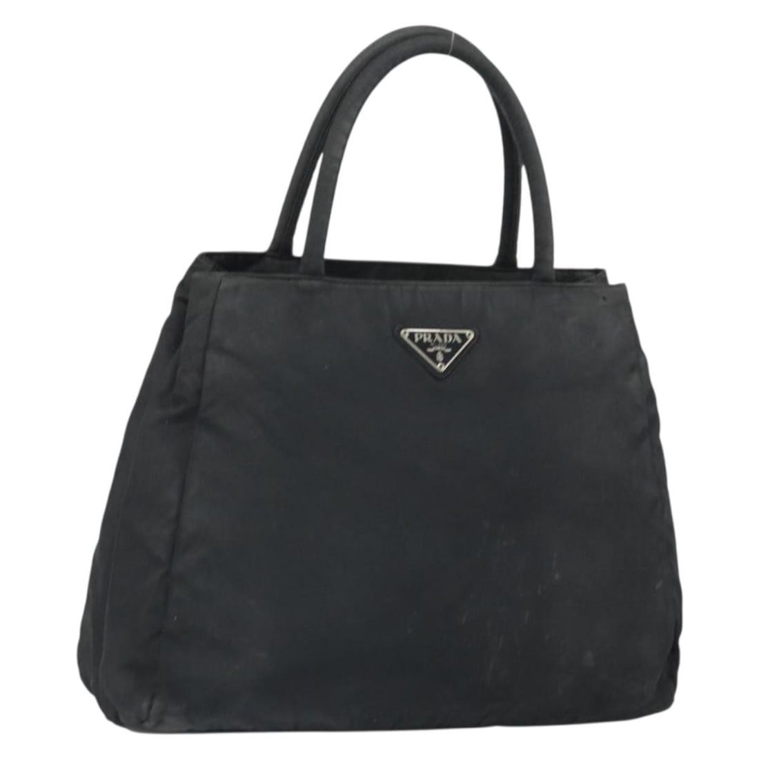 Black Nylon Prada Handbag with Guarantee Card Made in Italy: Black Nylon Prada Handbag with Guarantee Card Made in Italy This Prada hand bag is crafted from black nylon and features a simple, classic design. Made in Italy, it comes with a guarantee card and has