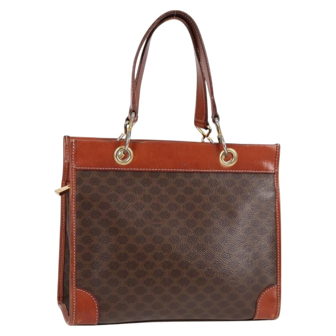 CELINE Brown PVC Macadam Canvas Shoulder Bag Made in Italy: CELINE Brown PVC Macadam Canvas Shoulder Bag Made in Italy This exquisite CELINE Macadam Canvas Shoulder Bag is crafted from durable PVC leather in a rich brown hue, embodying both style and functiona