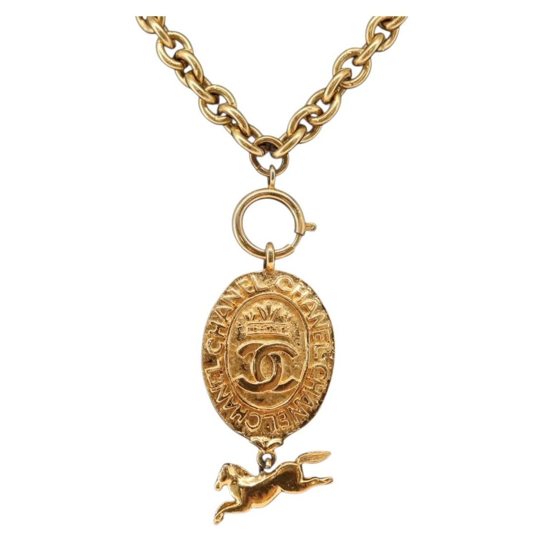 Gold Metal Necklace with CC Logo from Chanel Coco Collection: Gold Metal Necklace with CC Logo from Chanel Coco Collection This CHANEL necklace features the iconic Coco Mark CC design in gold-tone metal. Crafted in France, the necklace measures approximately 42