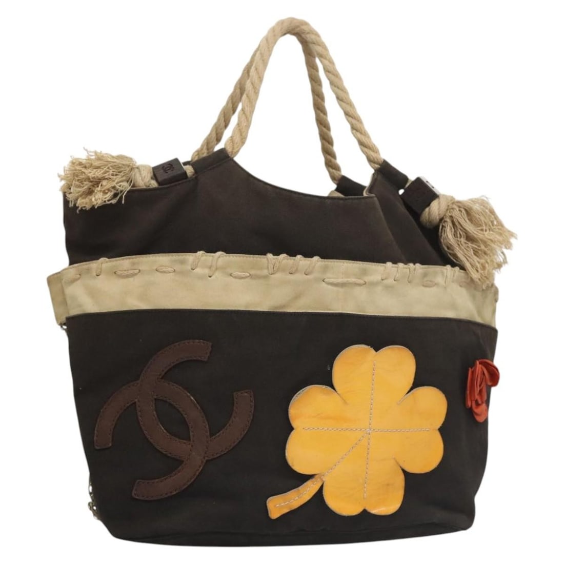CHANEL Camelia Black Canvas Tote Bag Italy Authentic 116525: CHANEL Camelia Black Canvas Tote Bag Italy Authentic 116525 This CHANEL Camelia Tote Bag is a stylish accessory crafted from durable black canvas, showcasing the iconic CC logo. Designed with practica