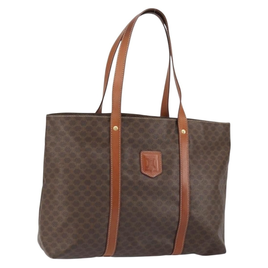 Celine Macadam Brown PVC Leather Tote Bag Gold Tone Accents Italy: Celine Macadam Brown PVC Leather Tote Bag Gold Tone Accents Italy This CELINE Macadam tote bag features brown and gold PVC leather with the signature Macadam canvas design. The bag is made in Italy an