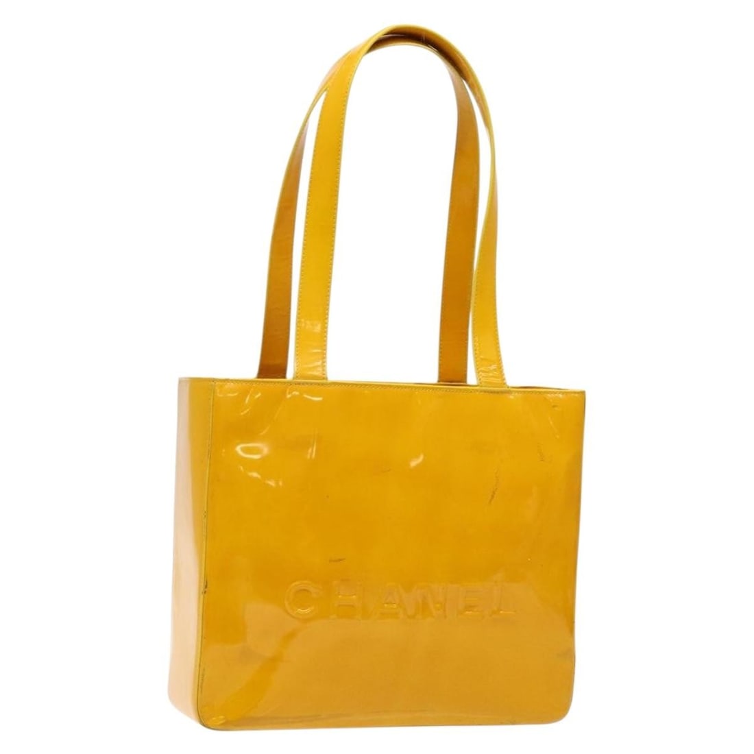 Authentic CHANEL Yellow Patent Leather Tote Bag France: Authentic CHANEL Yellow Patent Leather Tote Bag France This CHANEL tote bag features a vibrant yellow hue and is crafted from high-quality patent leather, making it a stylish addition to your accessor
