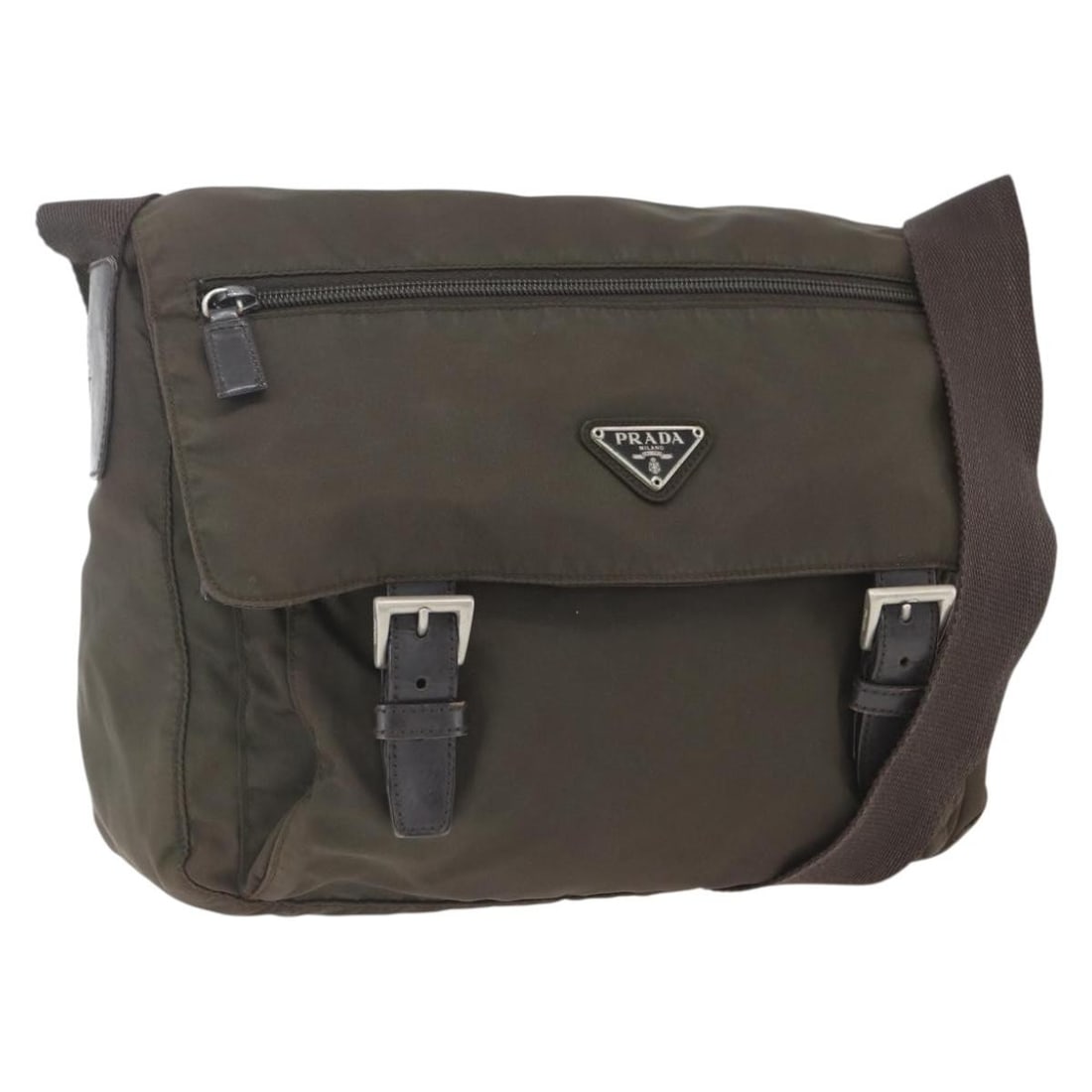 Brown Nylon Shoulder Purse by PRADA Made in Italy: Brown Nylon Shoulder Purse by PRADA Made in Italy This PRADA shoulder bag features a brown and silver color combination with a nylon exterior. The bag is designed with an adjustable shoulder strap and