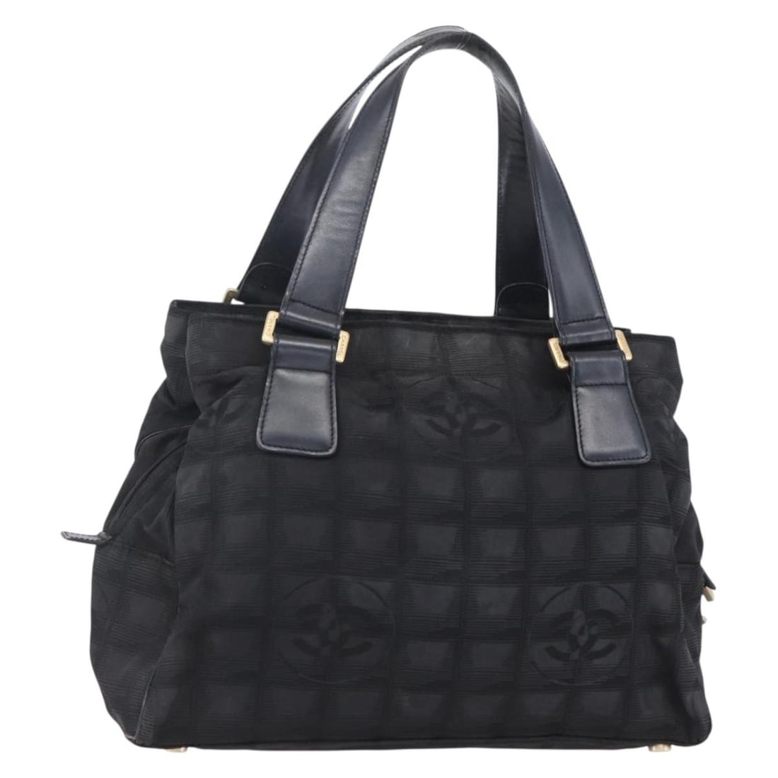 Chanel Black Nylon New Travel Line Gold CC Logo Handbag: Chanel Black Nylon New Travel Line Gold CC Logo Handbag This is a CHANEL Travel Line hand bag crafted from black nylon with gold accents. Made in Italy, this bag features a spacious interior and dual