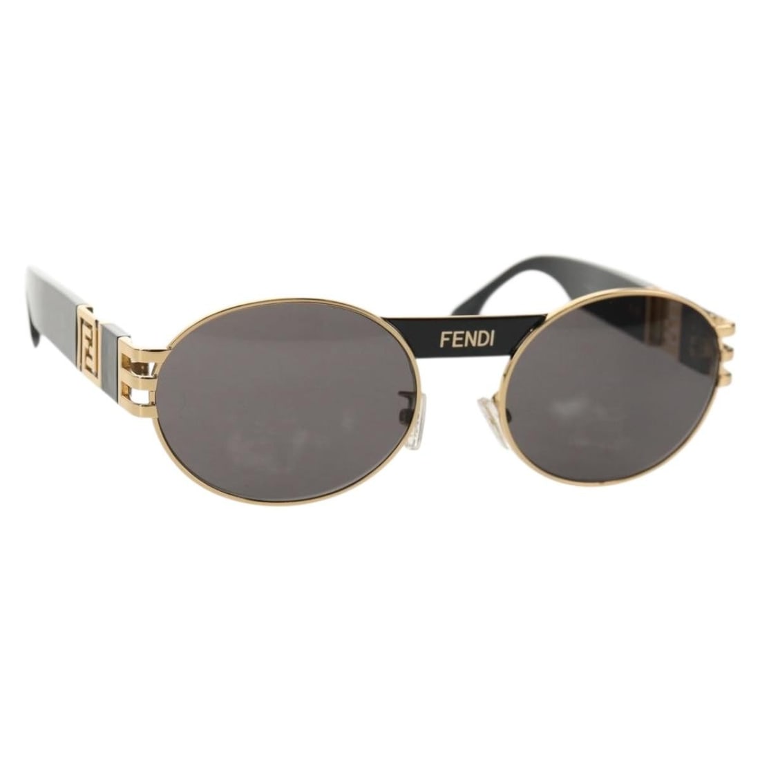 FENDI Fenderche Versace Collaboration Black Metal Sunglasses: FENDI Fenderche Versace Collaboration Black Metal Sunglasses Elevate your style with these FENDI Fenderche sunglasses, a stunning collaboration with Versace. Crafted in Italy, these sunglasses feature