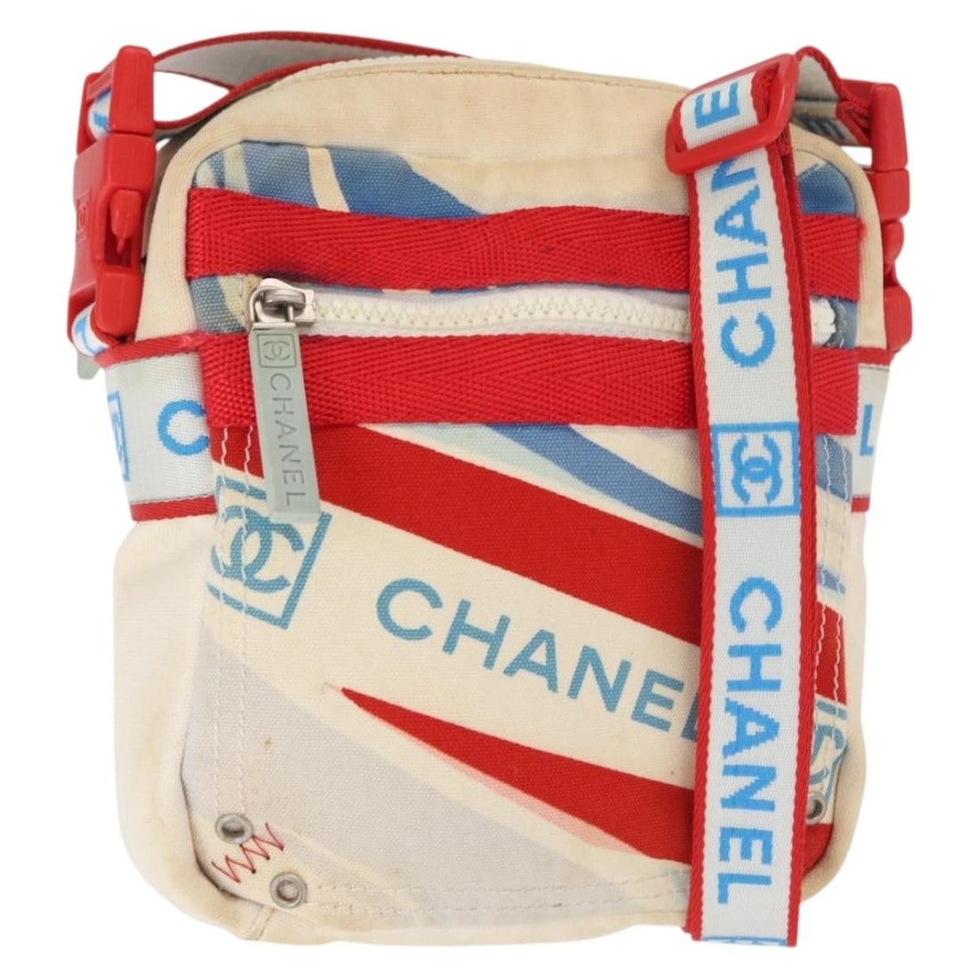 Chanel White Silver Canvas Sports Line Shoulder Purse Italy: Chanel White Silver Canvas Sports Line Shoulder Purse Italy This CHANEL Sports Line shoulder bag is crafted from white and silver canvas. It features an adjustable shoulder strap and is designed for e