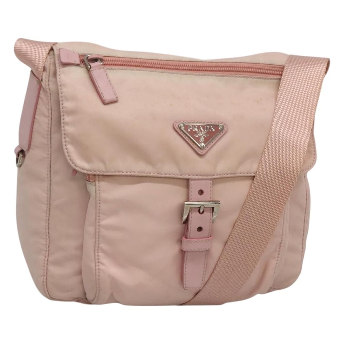 PRADA Pink Silver Nylon Shoulder Bag Made in Italy: PRADA Pink Silver Nylon Shoulder Bag Made in Italy This PRADA shoulder bag is a stylish accessory crafted from durable nylon, featuring a charming pink and silver color scheme. Designed with practical