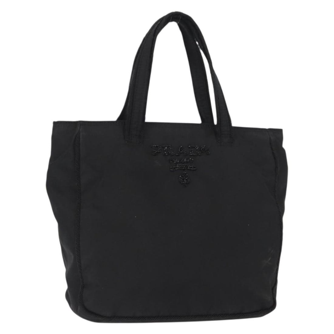 PRADA Black Nylon Hand Bag Made in Italy Authentic: PRADA Black Nylon Hand Bag Made in Italy Authentic This PRADA hand bag combines practicality with luxury in a stylish black nylon exterior. Crafted in Italy, this bag features approximate dimensions o