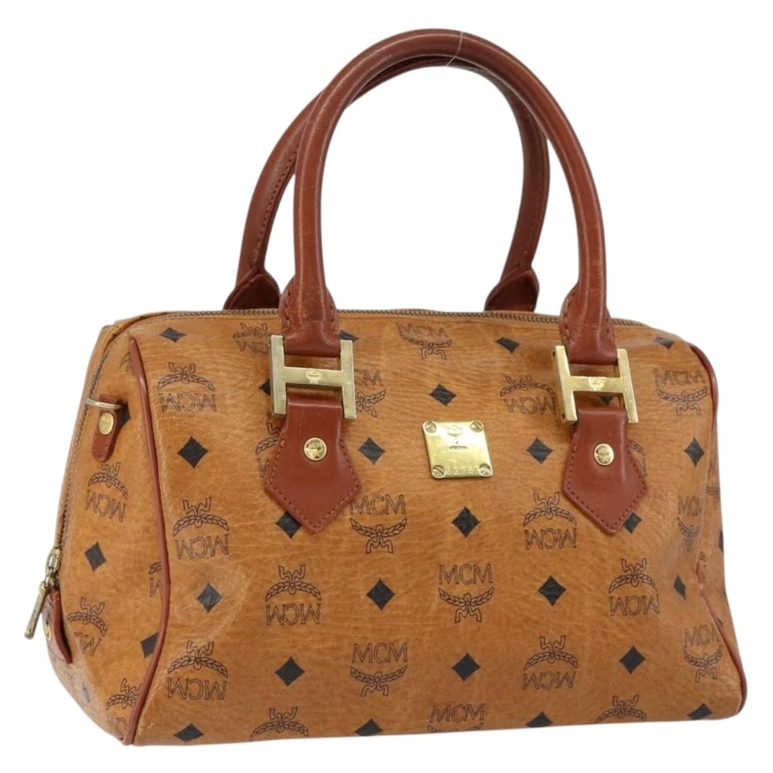 MCM Logogram Vicetos Hand Bag PVC Leather Brown Gold Germany: MCM Logogram Vicetos Hand Bag PVC Leather Brown Gold Germany This MCM Logogram Vicetos Hand Bag is a stylish accessory crafted from durable PVC leather in a classic brown and gold color scheme. Measur