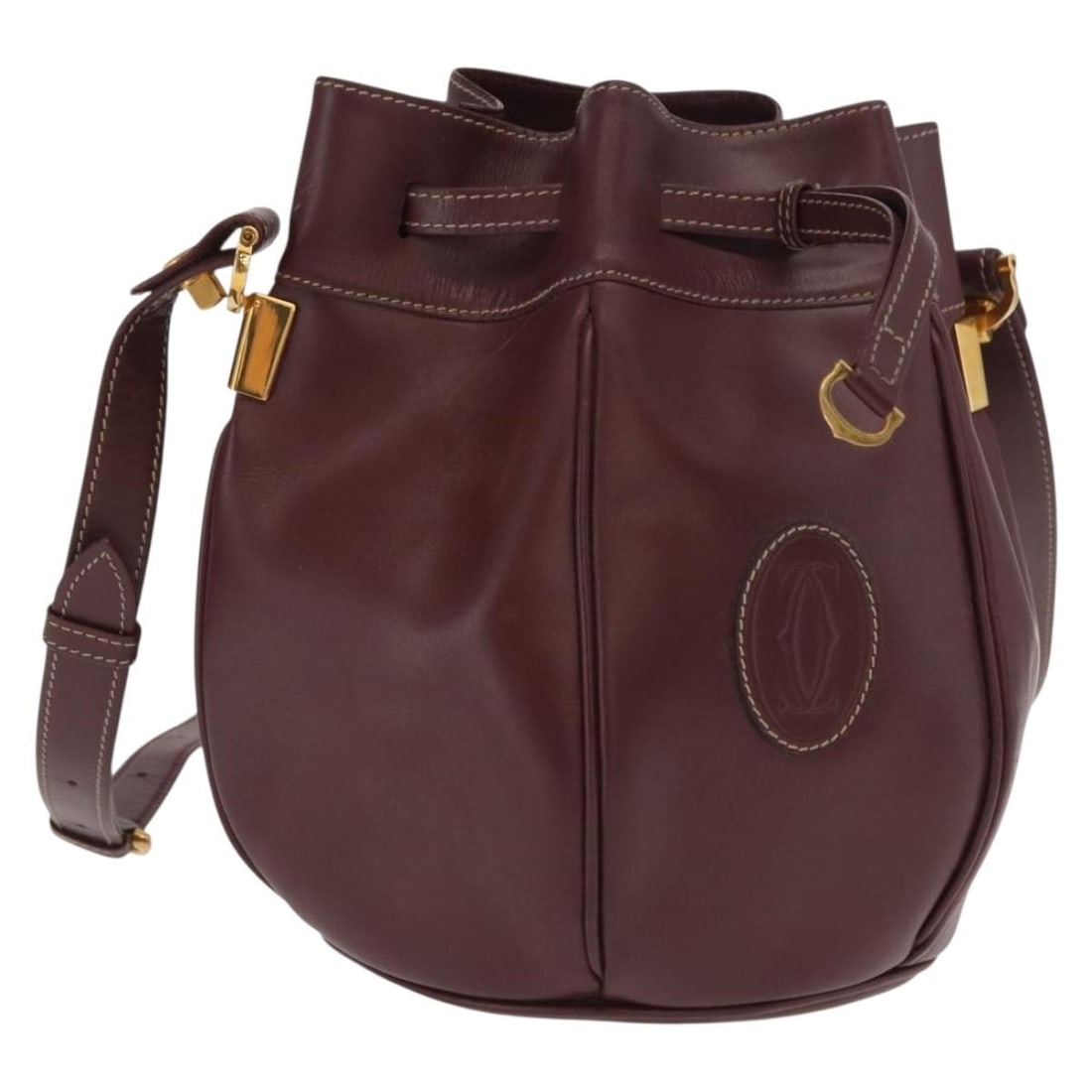 Cartier Must Line Bordeaux Leather Shoulder Bag Gold Accents Made in Italy: Cartier Must Line Bordeaux Leather Shoulder Bag Gold Accents Made in Italy This is a Cartier Must Line shoulder bag crafted from bordeaux leather with gold-tone accents. The bag features a structured