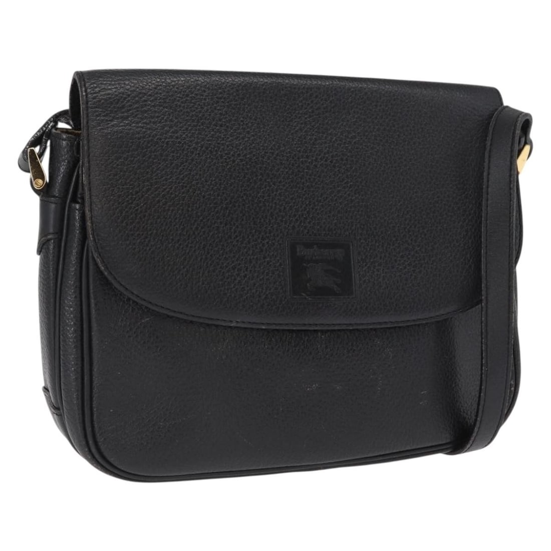 Burberrys Black Leather Shoulder Bag Gold Tone Accents: Burberrys Black Leather Shoulder Bag Gold Tone Accents This Burberrys shoulder bag features black leather with gold-tone accents. The bag offers a compact and structured design with an adjustable shou