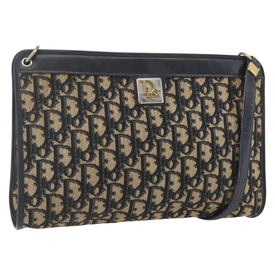 Christian Dior Navy Trotter Canvas Shoulder Bag Gold Accents France: Christian Dior Navy Trotter Canvas Shoulder Bag Gold Accents France This Christian Dior Trotter Canvas shoulder bag features a navy and gold color scheme with the signature Trotter canvas material. Th