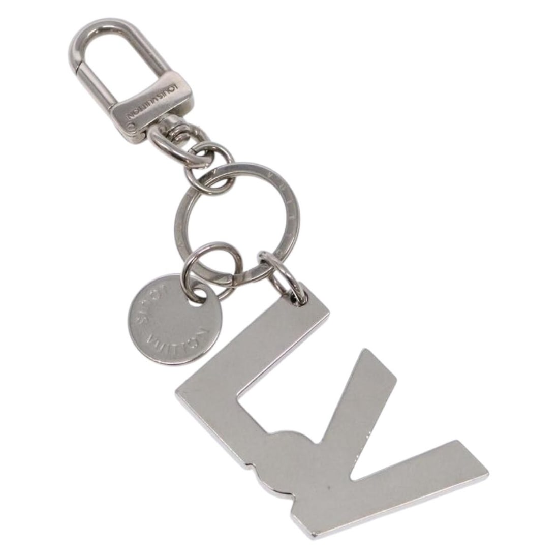 LOUIS VUITTON Silver Metal Rope Charm M66497 Made in Italy: LOUIS VUITTON Silver Metal Rope Charm M66497 Made in Italy Enhance your accessory collection with this exquisite LOUIS VUITTON Porte Cles LV Rope Charm. Made from high-quality metal, this charm featur