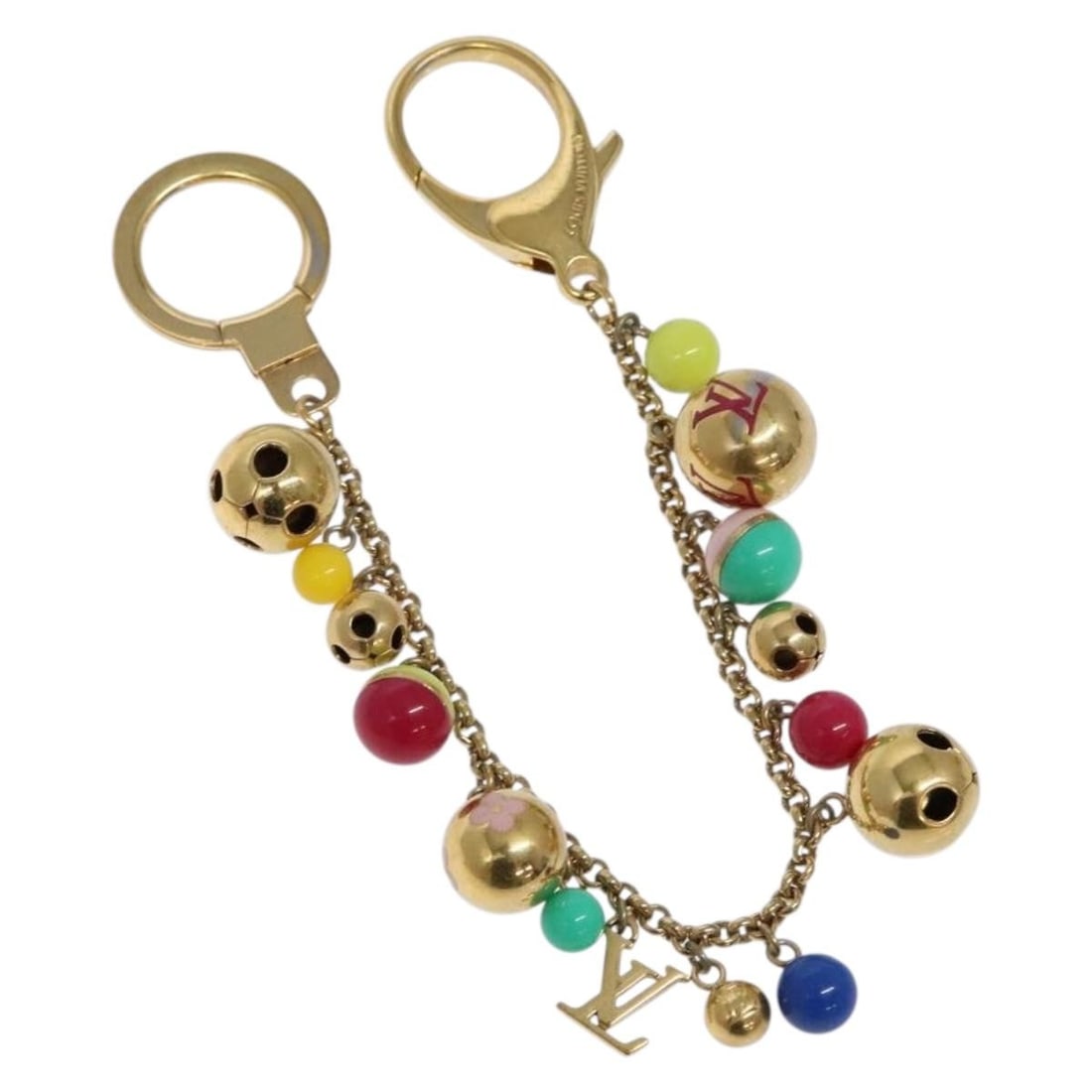 Louis Vuitton M62226 Monogram Grullo Multicolor Key Holder Metal Gold Tone: Louis Vuitton M62226 Monogram Grullo Multicolor Key Holder Metal Gold Tone This Louis Vuitton Monogram Porte Chainne Grullo key holder features a multicolor and gold-tone metal design. Crafted in Ital