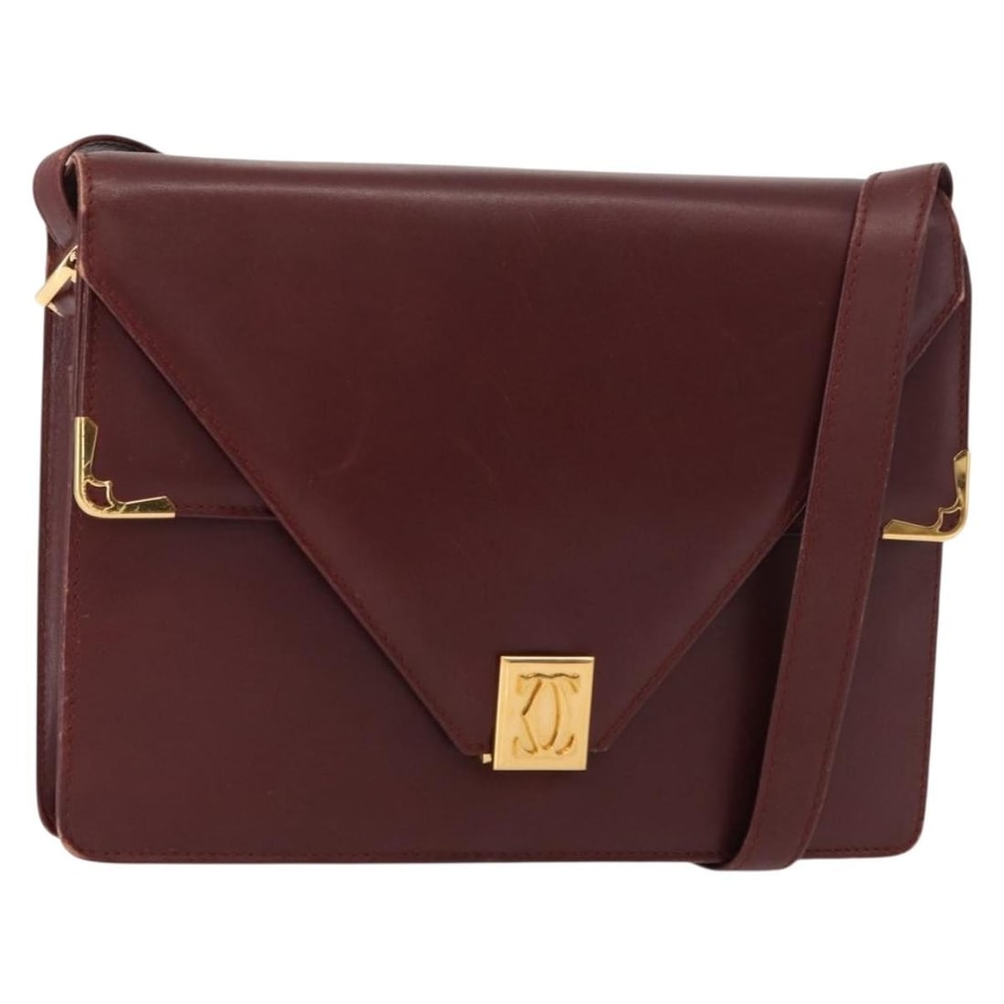 CARTIER Bordeaux Gold Leather Must Line Shoulder Bag: CARTIER Bordeaux Gold Leather Must Line Shoulder Bag This CARTIER Must Line Shoulder Bag showcases a luxurious design crafted from high-quality leather in a rich bordeaux and gold color combination. T