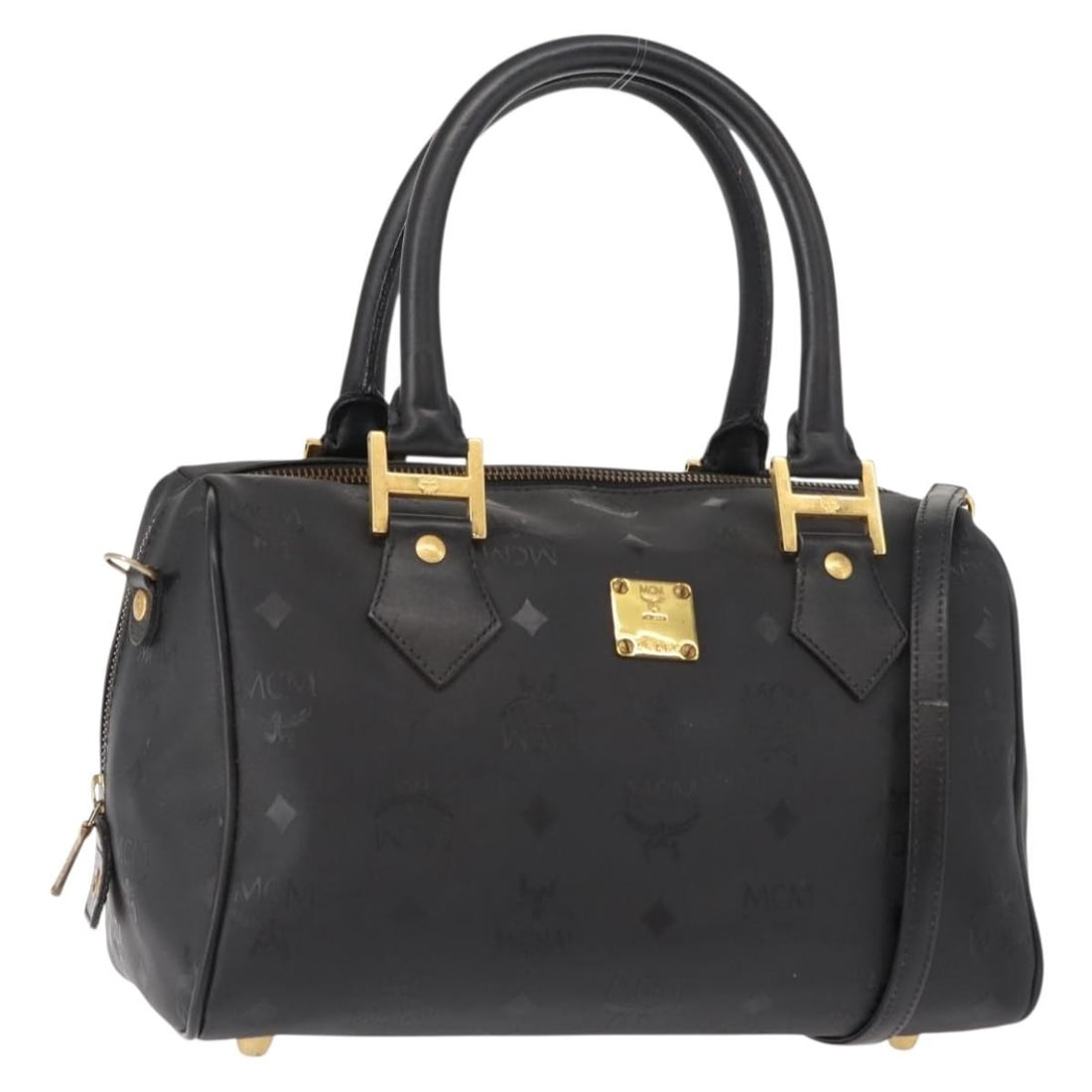 MCM Vicetos Logogram Black Gold PVC Hand Bag Auth 148328: MCM Vicetos Logogram Black Gold PVC Hand Bag Auth 148328 Introducing the MCM Vicetos Logogram Hand Bag, a stylish accessory crafted in Germany. This bag features a sleek black and gold color scheme an
