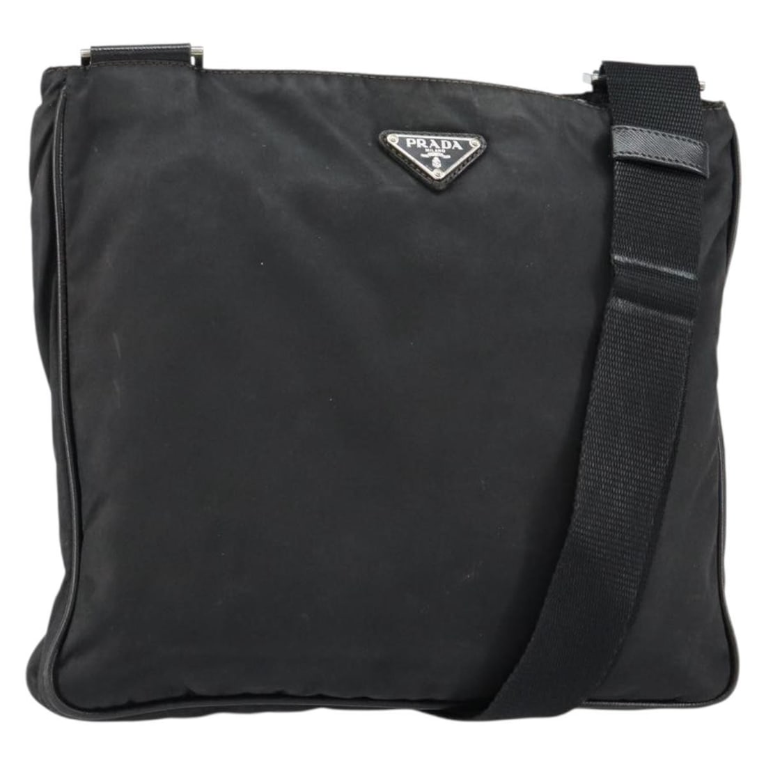 PRADA Black Nylon Shoulder Bag Silver Auth 153239: PRADA Black Nylon Shoulder Bag Silver Auth 153239 This PRADA shoulder bag is a stylish and practical accessory, crafted from durable nylon in a classic black and silver color scheme. With approximate