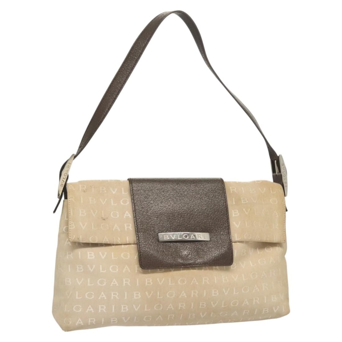 Beige Silver Canvas Logo Mania Shoulder Bag by BVLGARI: Beige Silver Canvas Logo Mania Shoulder Bag by BVLGARI This BVLGARI Logo Mania shoulder bag features a beige and silver canvas exterior with silver-tone accents. Designed as a shoulder bag, it offers
