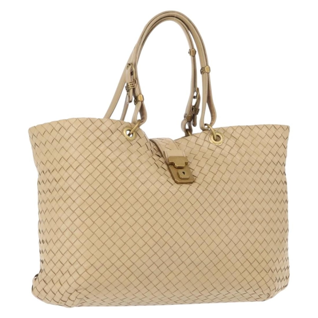 Beige Leather Intrecciato Tote by Bottega Veneta Italy: Beige Leather Intrecciato Tote by Bottega Veneta Italy This Bottega Veneta Intrecciato tote bag is crafted from beige leather and features a spacious design with dual handles. Made in Italy, the bag i
