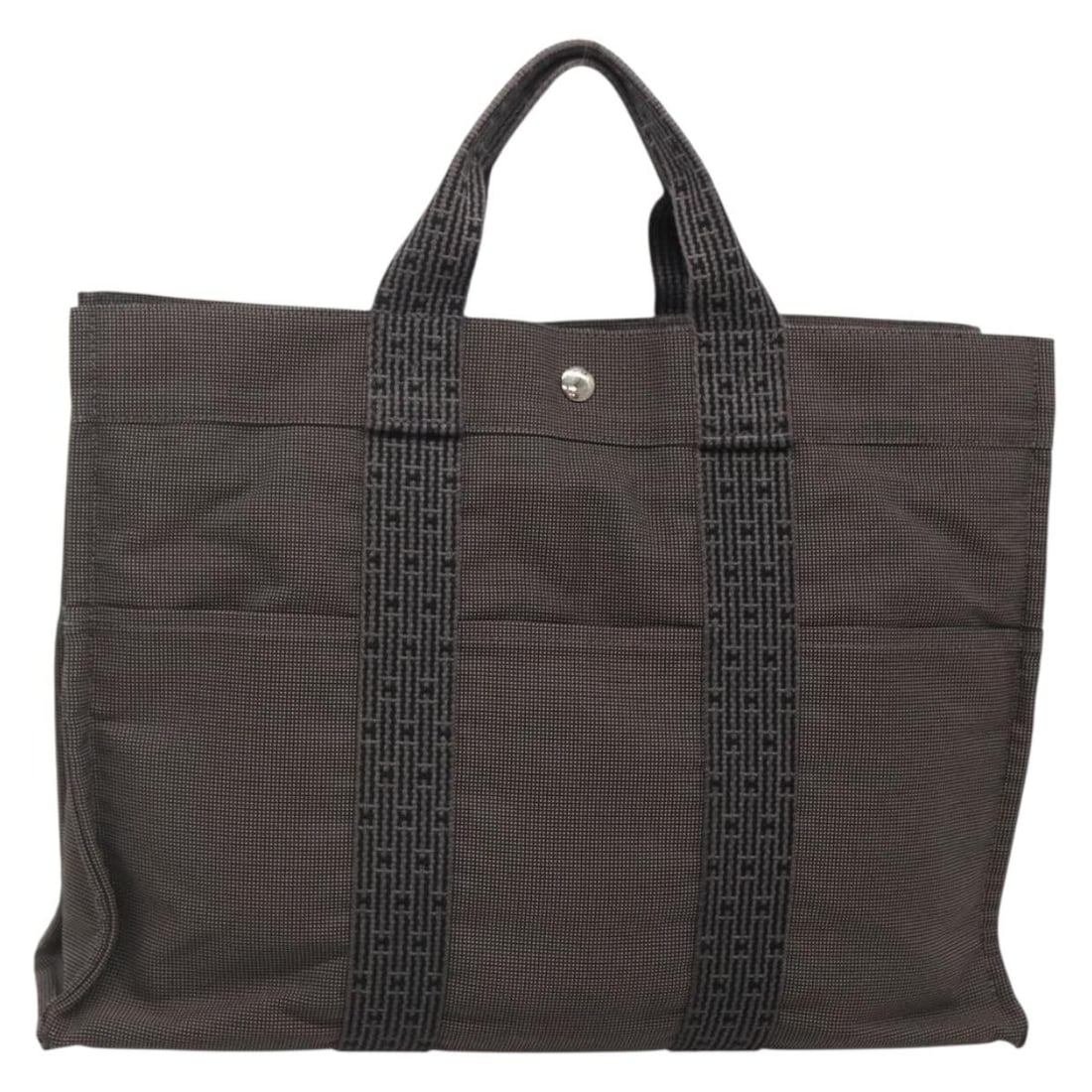 HERMES Her Line MM Hand Bag Gray Silver Canvas Made in France: HERMES Her Line MM Hand Bag Gray Silver Canvas Made in France This HERMES Her Line MM Hand Bag is a stylish and practical accessory crafted from durable canvas in a sophisticated gray and silver color