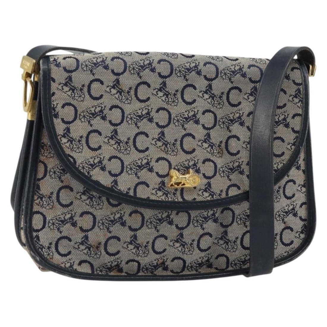 Celine Sulky Canvas Shoulder Purse Navy and Gold Tone France: Celine Sulky Canvas Shoulder Purse Navy and Gold Tone France This is a Celine C Sulky shoulder bag crafted from navy and gold canvas. The bag is made in France and features a shoulder strap with a dro
