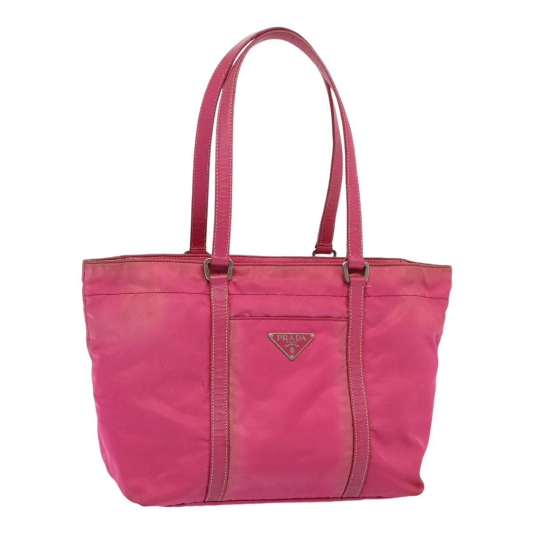 PRADA Pink Nylon Hand Bag Made in Italy Authentic: PRADA Pink Nylon Hand Bag Made in Italy Authentic This authentic PRADA hand bag features a stylish pink nylon exterior, showcasing the brand's signature elegance. With dimensions of approximately 10.2