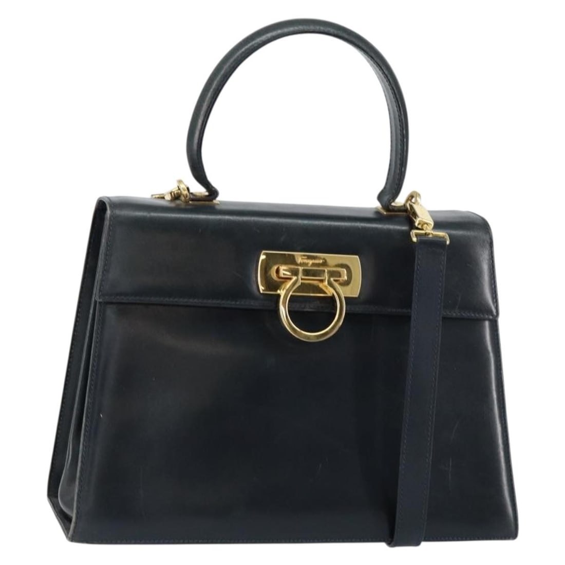 Salvatore Ferragamo Gancini Leather Hand Bag Navy Gold 2way Auth: Salvatore Ferragamo Gancini Leather Hand Bag Navy Gold 2way Auth This Salvatore Ferragamo Gancini Hand Bag showcases a sophisticated blend of navy leather and gold accents, epitomizing Italian craftsm