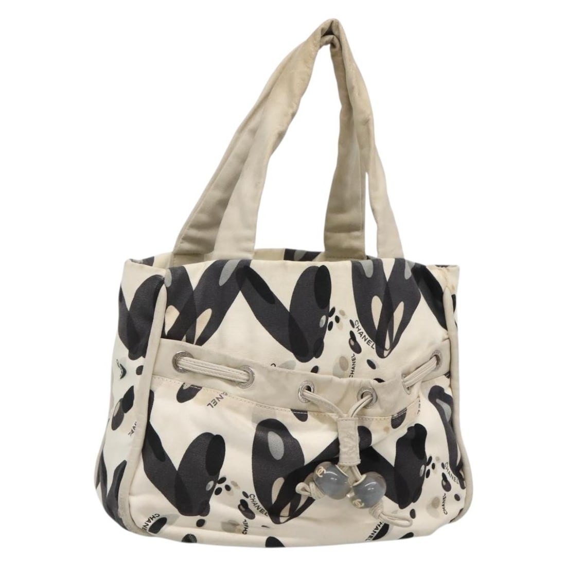 CHANEL White Silver Canvas Tote Bag Made in Italy Auth 134829: CHANEL White Silver Canvas Tote Bag Made in Italy Auth 134829 This authentic CHANEL tote bag showcases a chic design crafted from durable canvas in a striking white and silver color combination. With