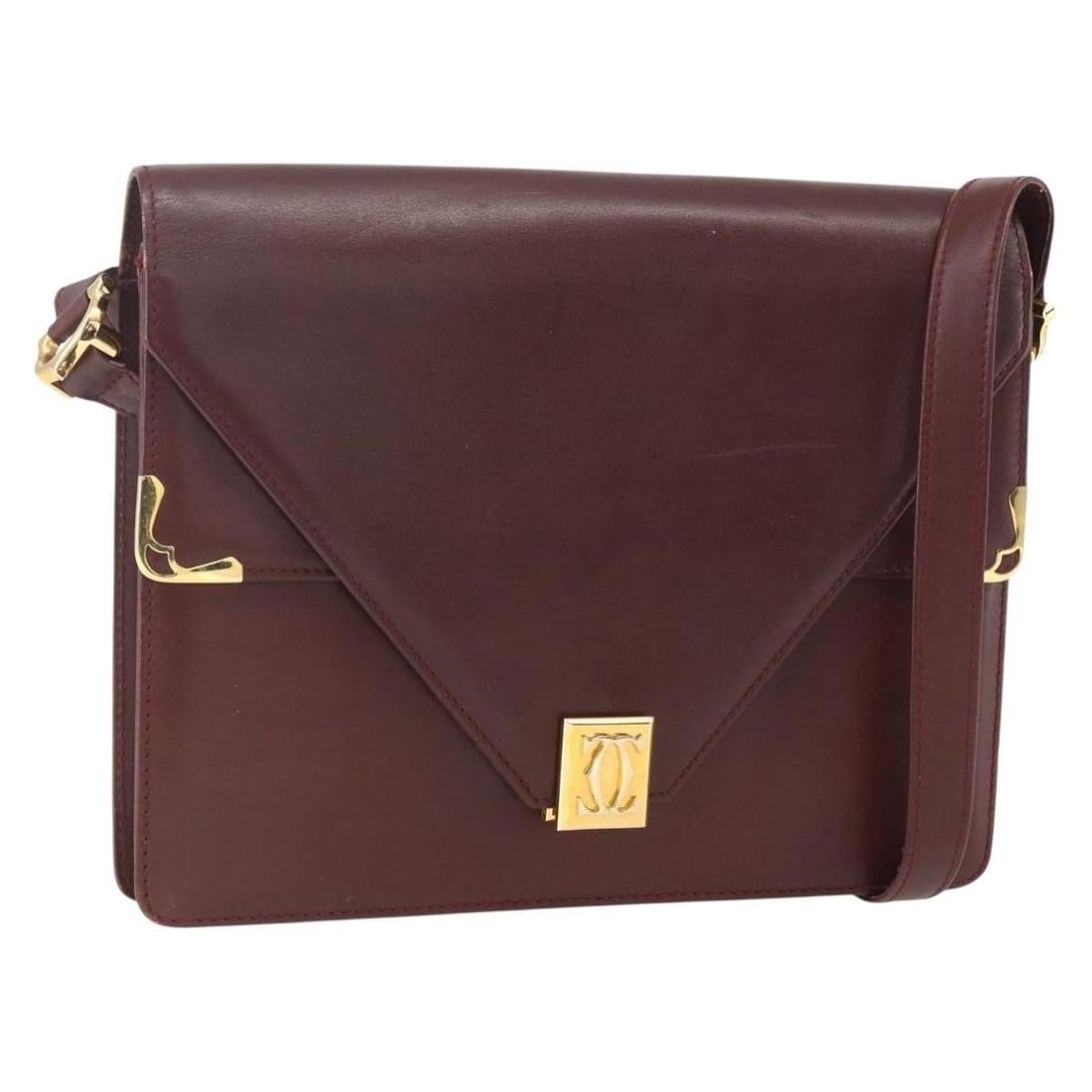 CARTIER Must Line Bordeaux Leather Shoulder Bag Gold Accents: CARTIER Must Line Bordeaux Leather Shoulder Bag Gold Accents This authentic CARTIER Must Line Shoulder Bag is crafted from premium leather in a sophisticated Bordeaux and Gold color scheme. Made in Sp