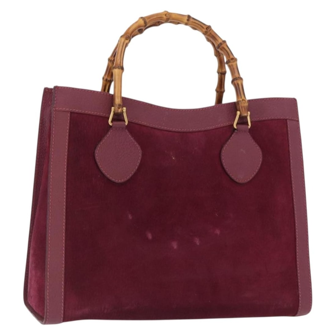 Purple Suede GUCCI Bamboo Handle Bag with Gold Accents 002 123 0260: Purple Suede GUCCI Bamboo Handle Bag with Gold Accents 002 123 0260 This Gucci Bamboo hand bag features a purple and gold suede exterior with bamboo handles. The bag measures approximately 13.4 inches