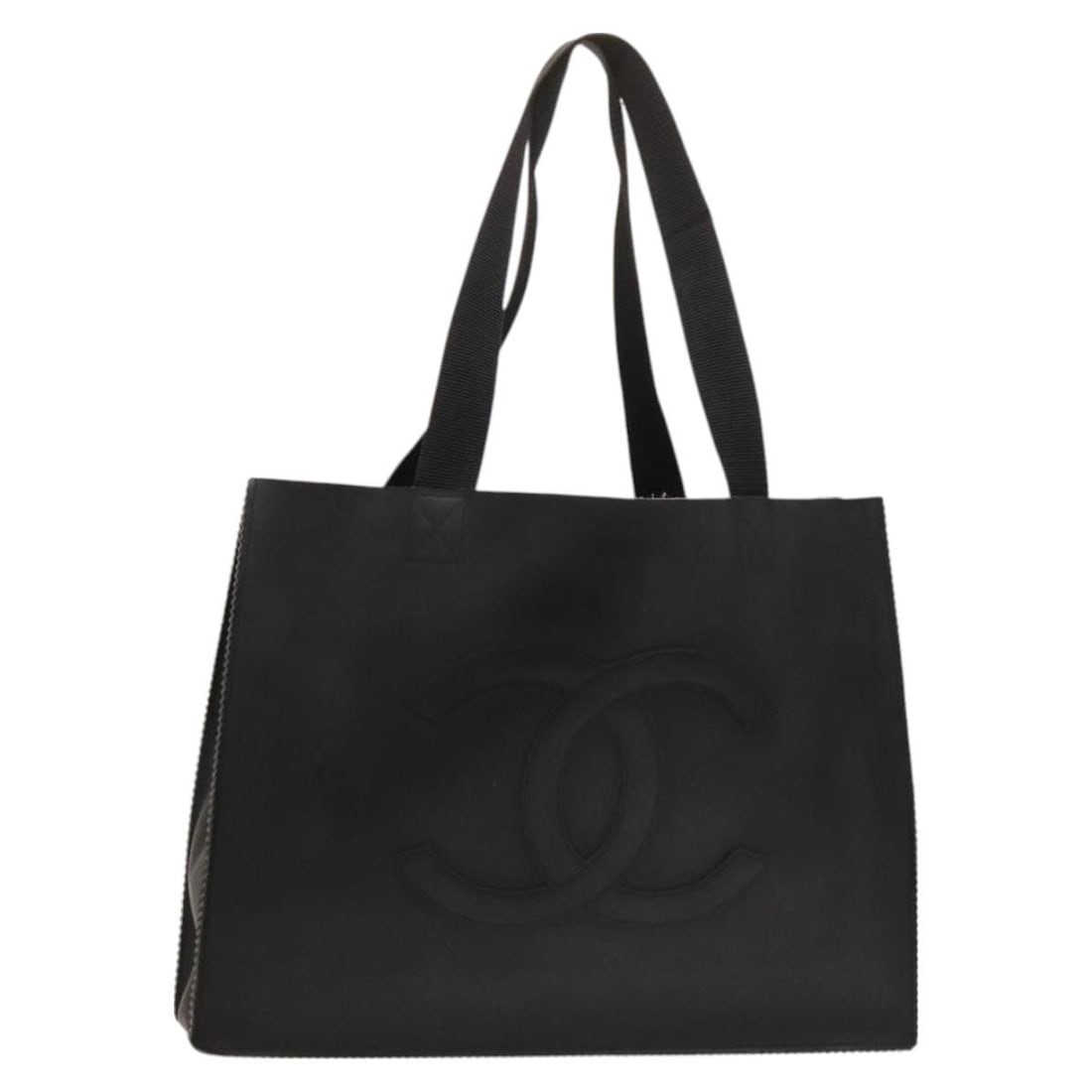 Chanel Black Rubber Tote Bag with CC Logo and Repainted Exterior: Chanel Black Rubber Tote Bag with CC Logo and Repainted Exterior This CHANEL Coco Mark tote bag is crafted from black rubber and features the iconic CC logo. The bag has been repainted by a non-offici