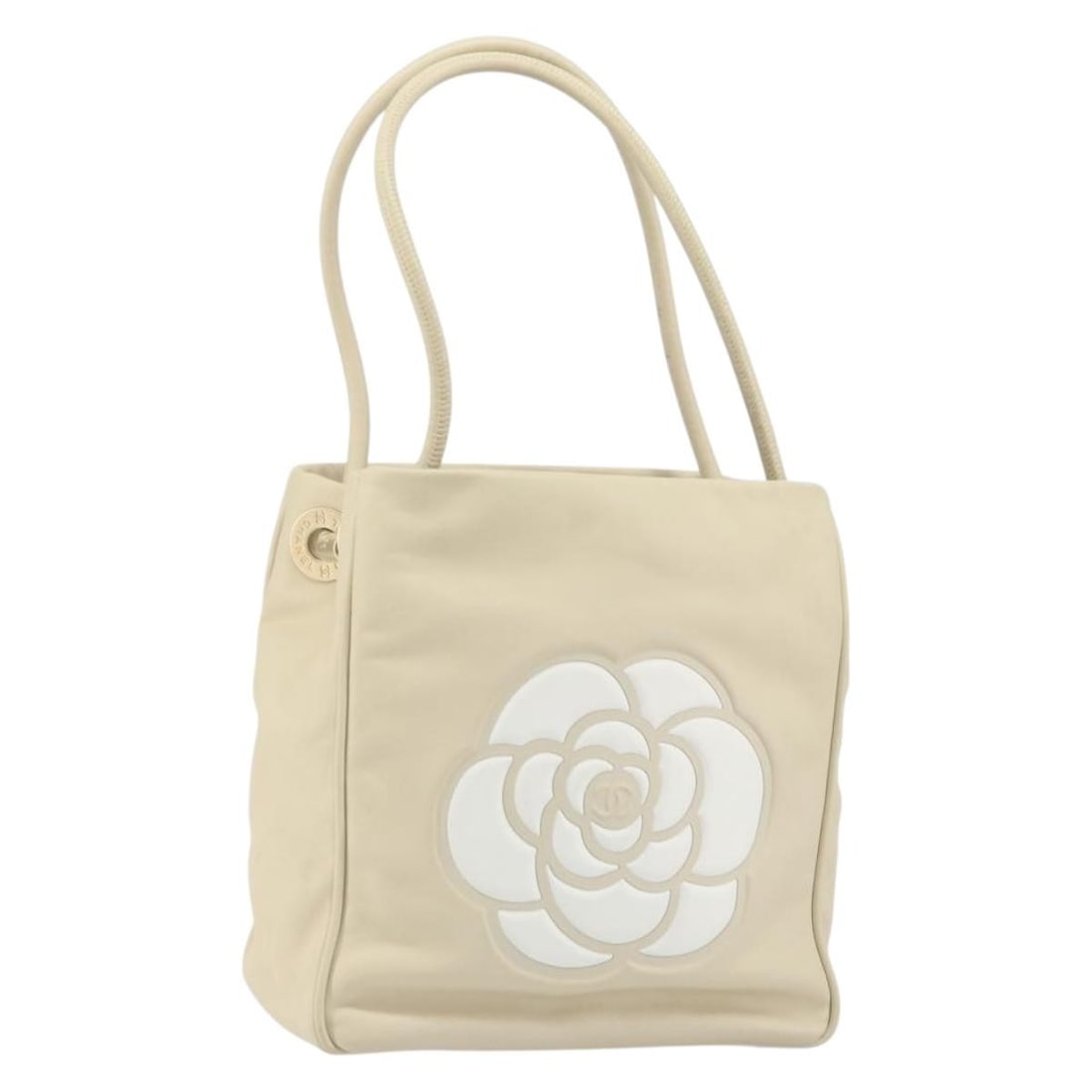Beige Leather Camelia Tote with Gold CC by Chanel: Beige Leather Camelia Tote with Gold CC by Chanel This CHANEL Camelia tote bag features beige leather with gold accents and the signature CC design. The bag is made in France and comes with a guarante