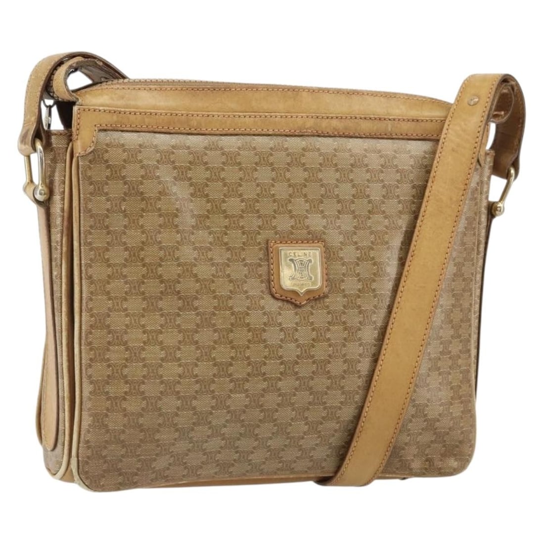 Beige PVC Macadam Canvas Shoulder Bag by CELINE with Gold Accents: Beige PVC Macadam Canvas Shoulder Bag by CELINE with Gold Accents This CELINE Macadam shoulder bag features beige and gold PVC leather with the iconic Macadam canvas design. The bag is crafted in Ital