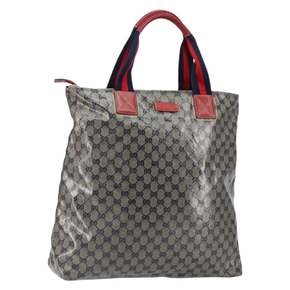 Navy Gold Gucci GG Crystal Tote 131233 Coated Canvas Handbag Italy: Navy Gold Gucci GG Crystal Tote 131233 Coated Canvas Handbag Italy This is a Gucci GG Crystal tote bag crafted from coated canvas in a navy and gold color combination. The bag features a spacious inte