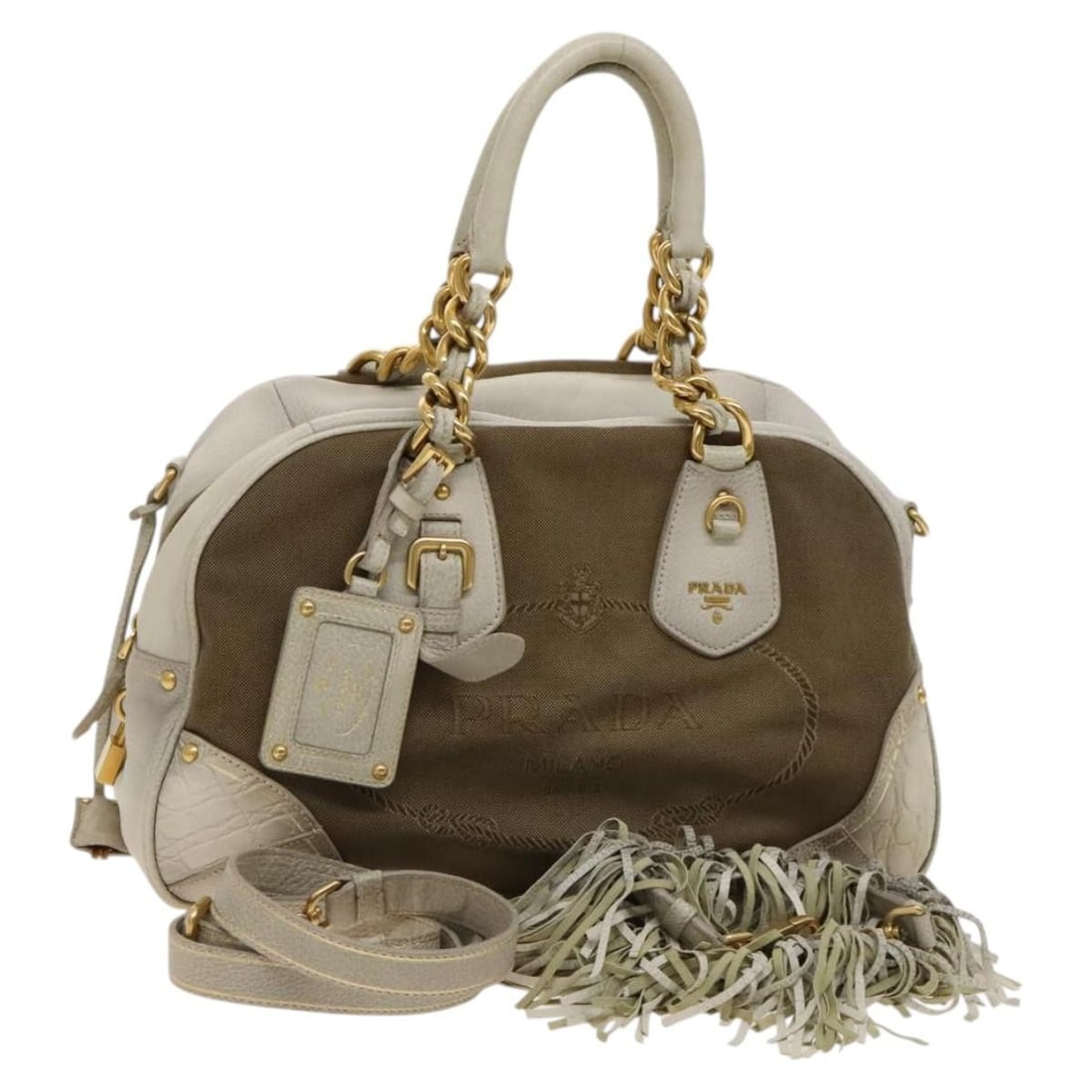 Authentic PRADA Beige Gold Canvas 2-Way Hand Bag 117858: Authentic PRADA Beige Gold Canvas 2-Way Hand Bag 117858 This PRADA Hand Bag combines style and functionality, featuring a chic beige canvas exterior accented with gold tones. The spacious interior is