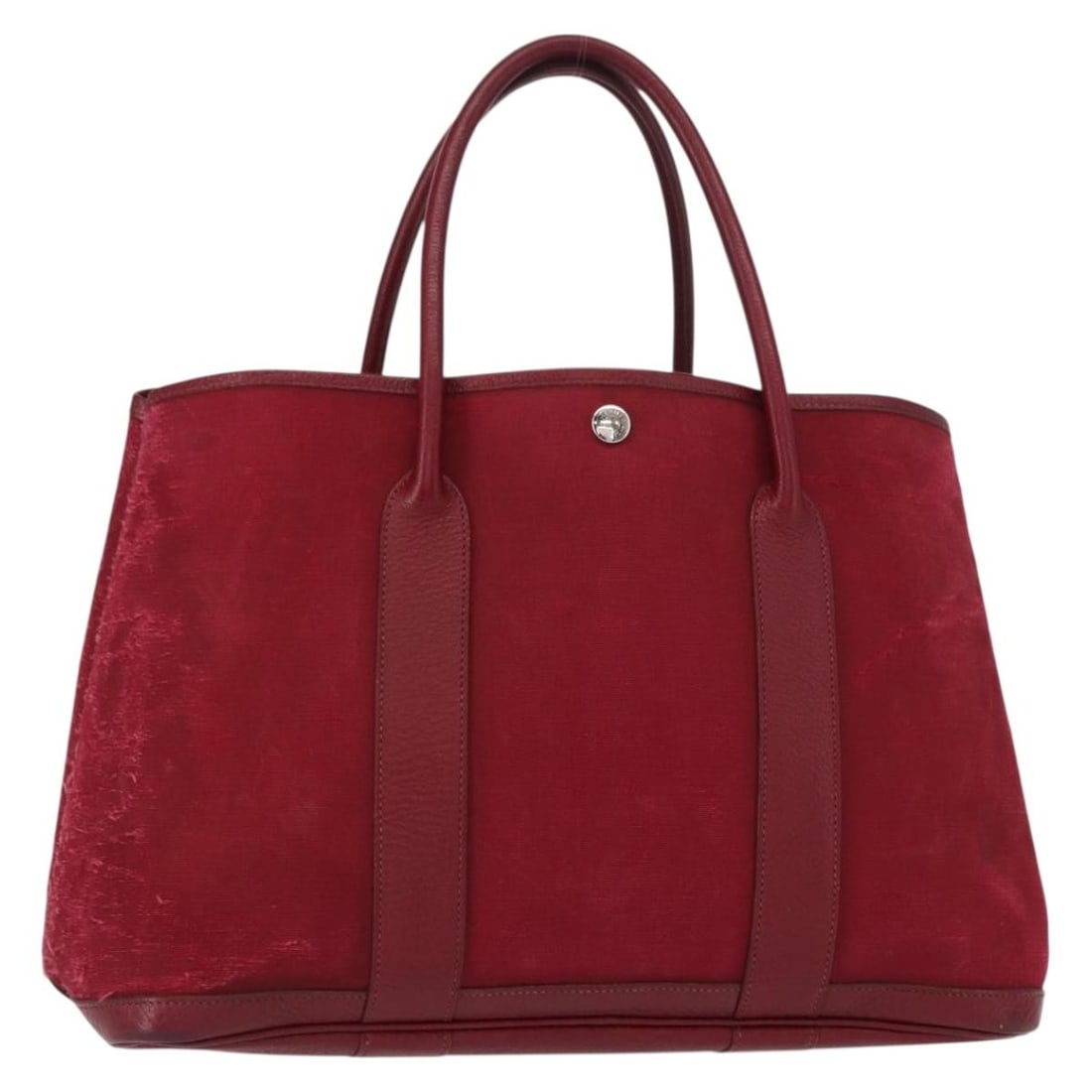 HERMES Garden Party MM Hand Bag Red Canvas Authentic: HERMES Garden Party MM Hand Bag Red Canvas Authentic The HERMES Garden Party MM Hand Bag is a stylish and sophisticated accessory crafted from high-quality canvas in a striking red color. This hand ba