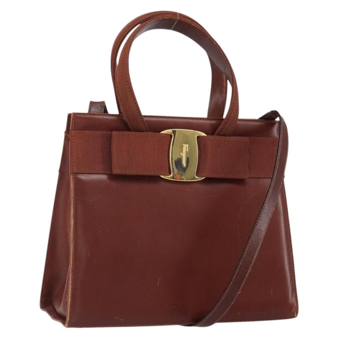 Brown Leather Gancini Shoulder and Handbag by Salvatore Ferragamo with Strap: Brown Leather Gancini Shoulder and Handbag by Salvatore Ferragamo with Strap This Salvatore Ferragamo Gancini handbag is crafted from brown leather with gold-tone accents and offers versatile 2-way us