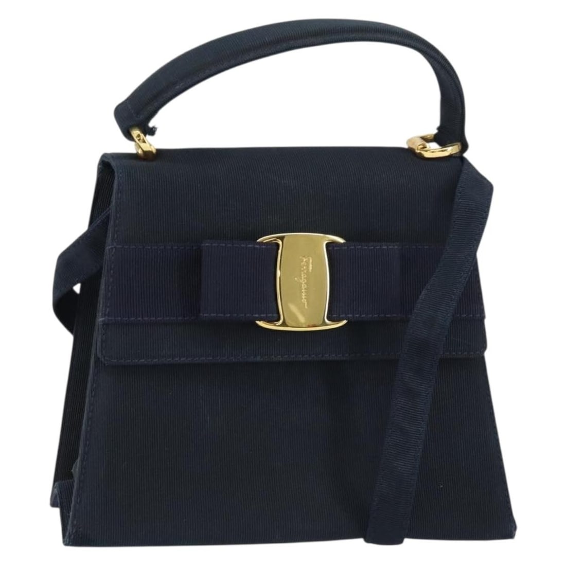 Salvatore Ferragamo Vala Navy Gold Canvas Hand Bag Authentic: Salvatore Ferragamo Vala Navy Gold Canvas Hand Bag Authentic This Salvatore Ferragamo Vala Hand Bag showcases a stylish design crafted from durable canvas, featuring a chic navy and gold color scheme.