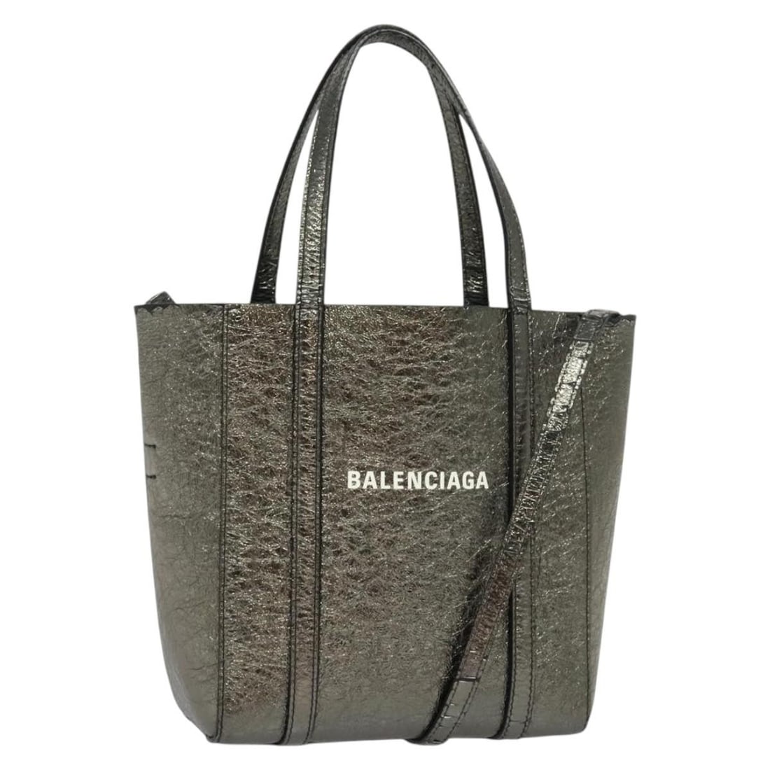 BALENCIAGA Everyday Tote XS Leather Bag Silver Italy Auth: BALENCIAGA Everyday Tote XS Leather Bag Silver Italy Auth Introducing the BALENCIAGA Everyday Tote XS, an exquisite blend of style and functionality. This stylish tote bag is crafted from premium leat