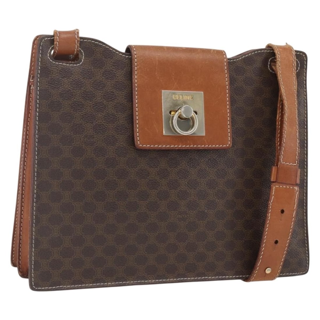 Celine Macadam Canvas and PVC Leather Brown Shoulder Bag Gold Accents: Celine Macadam Canvas and PVC Leather Brown Shoulder Bag Gold Accents This CELINE Macadam shoulder bag features a brown and gold PVC leather exterior with the signature Macadam canvas design. Crafted