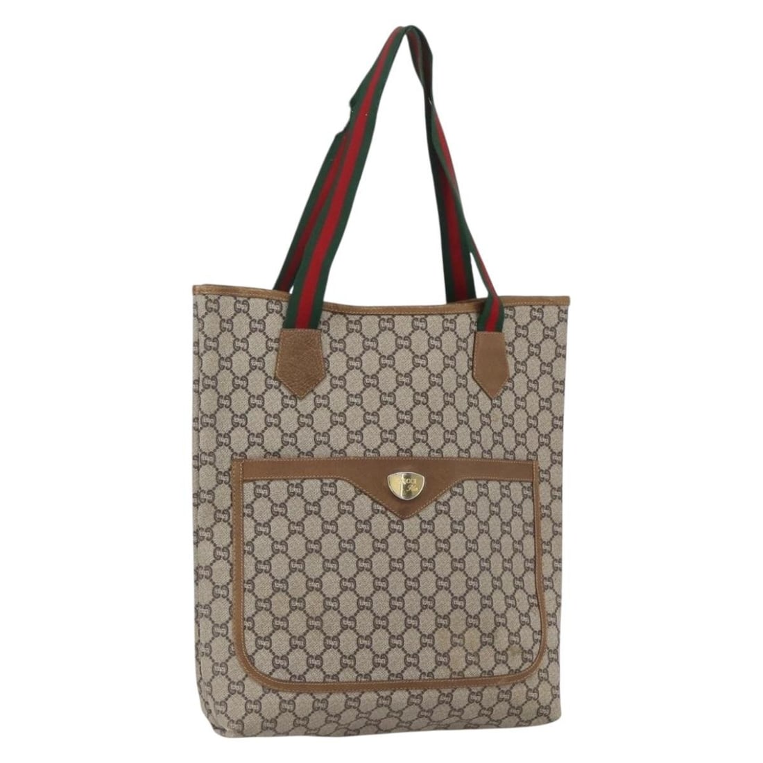 Beige GG Plus Supreme Sherry Line Gucci Tote Bag PVC and Leather: Beige GG Plus Supreme Sherry Line Gucci Tote Bag PVC and Leather This is a Gucci GG Plus Supreme Web Sherry Line tote bag crafted from beige and gold PVC leather with GG canvas. The bag features dual