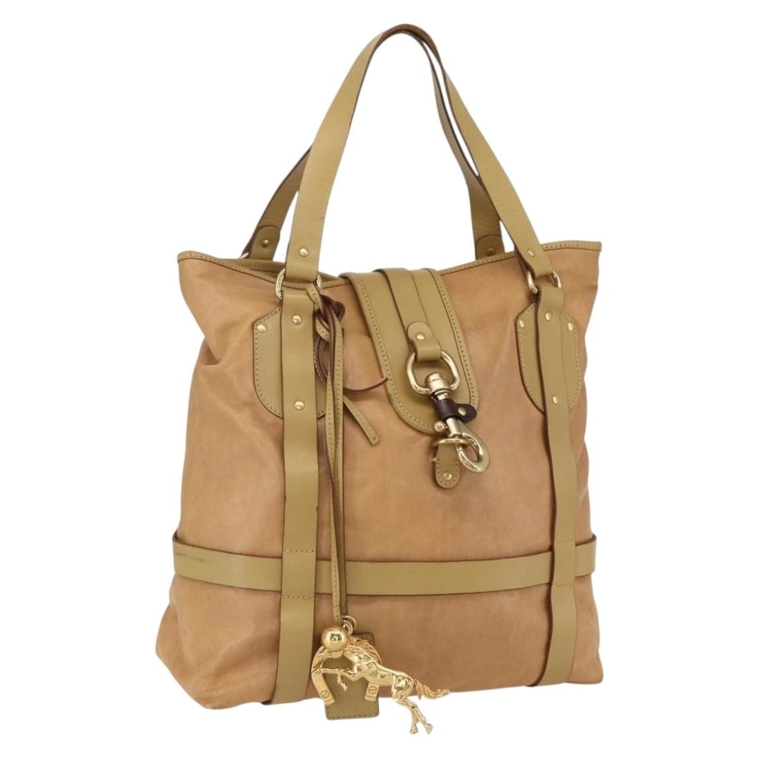 Chloe Leather Tote in Beige and Gold Made in Italy: Chloe Leather Tote in Beige and Gold Made in Italy This Chloe tote bag is crafted from beige and gold leather and features a spacious silhouette. Made in Italy, it is designed with dual top handles an