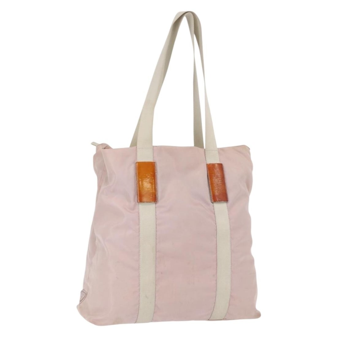 Pink Nylon Tote by PRADA Silver Accents Italian Made: Pink Nylon Tote by PRADA Silver Accents Italian Made This PRADA tote bag features pink and silver nylon construction with silver-tone hardware. Made in Italy, the bag offers a spacious interior and a