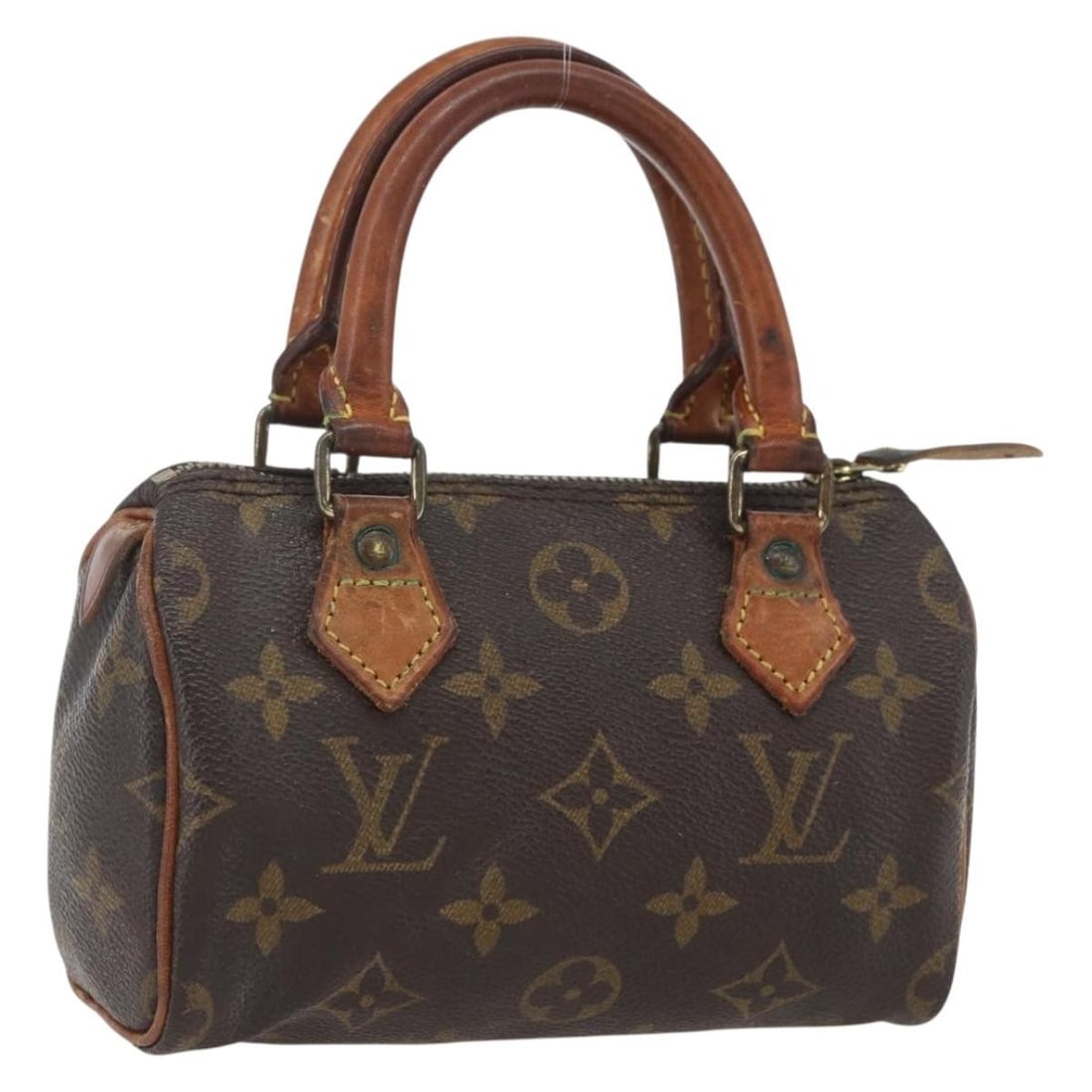 Louis Vuitton Mini Speedy Monogram Canvas Handbag M41534 France: Louis Vuitton Mini Speedy Monogram Canvas Handbag M41534 France This Louis Vuitton Monogram Mini Speedy Hand Bag features the iconic monogram canvas and was crafted in France. The compact design inclu