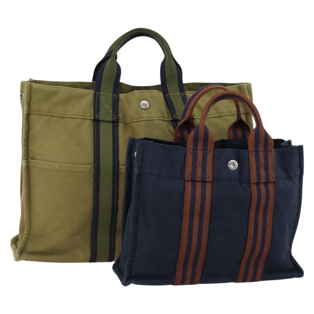 Set of 2 Hermes Fourre Tout Canvas Khaki Navy Handbags: Set of 2 Hermes Fourre Tout Canvas Khaki Navy Handbags This is an authentic Hermes Fourre Tout hand bag set featuring two canvas bags in khaki and navy. Made in France, these bags show significant sig
