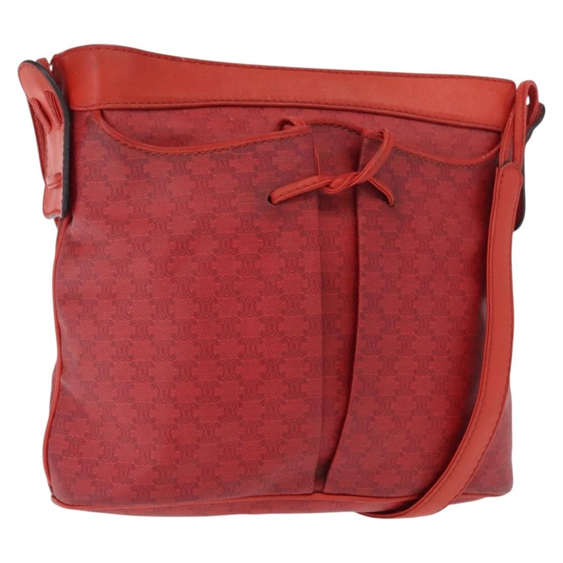 Red and Gold Macadam Canvas Shoulder Bag by CELINE: Red and Gold Macadam Canvas Shoulder Bag by CELINE This CELINE shoulder bag features the iconic Macadam canvas with leather accents in red and gold tones. Crafted in Italy, the bag offers a compact ye