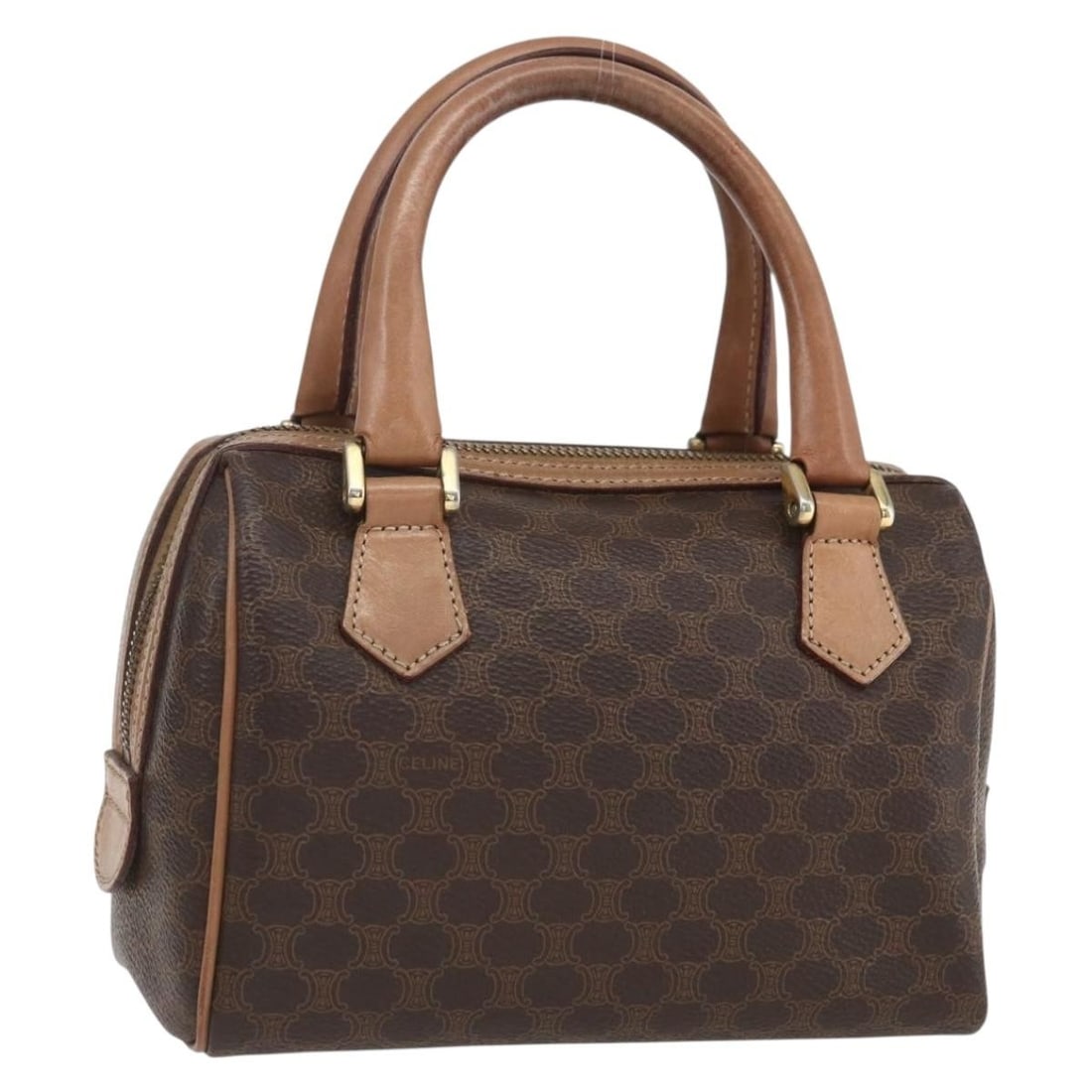 Mini Macadam Handbag by Celine in Brown PVC Leather Gold Accents: Mini Macadam Handbag by Celine in Brown PVC Leather Gold Accents This CELINE Macadam mini handbag features a brown and gold PVC leather exterior with a compact and stylish design. The bag is made in I